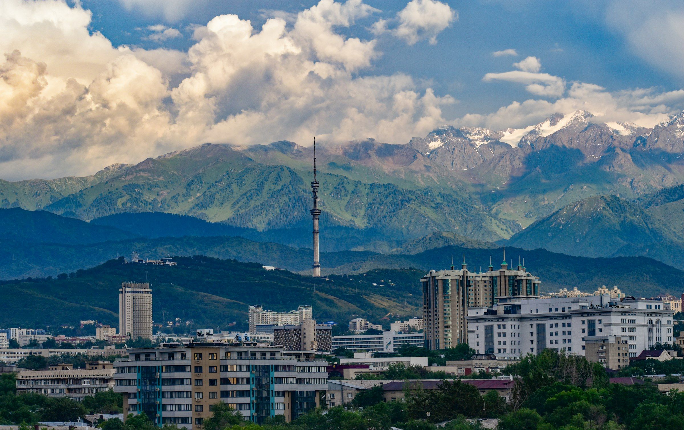 Almaty with its television tower and the snow-capped Trans-Ili Alatau mountains behind